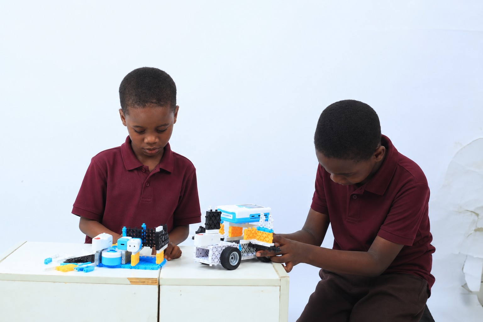 Nigerian primary-school learners building unbranded robotics projects